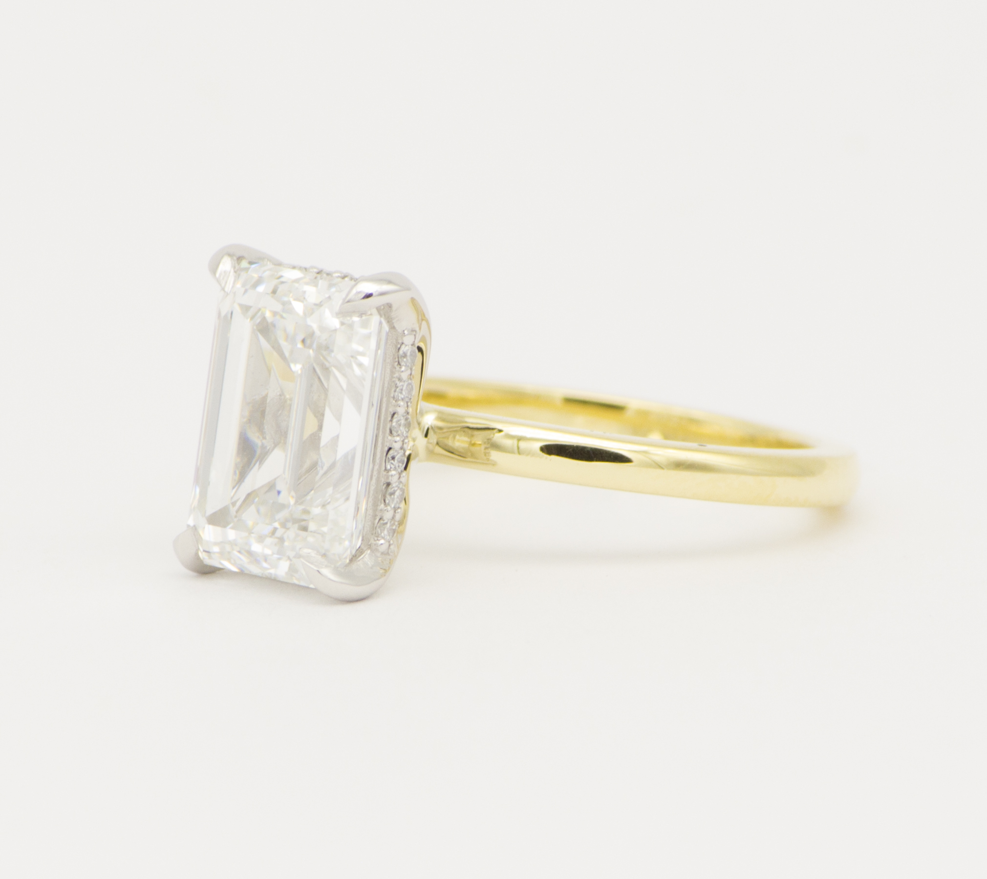 engagement ring 18k yellow gold and platinum with emerald cut diamond